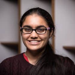 Charu Sharma poss for camera with a smile
