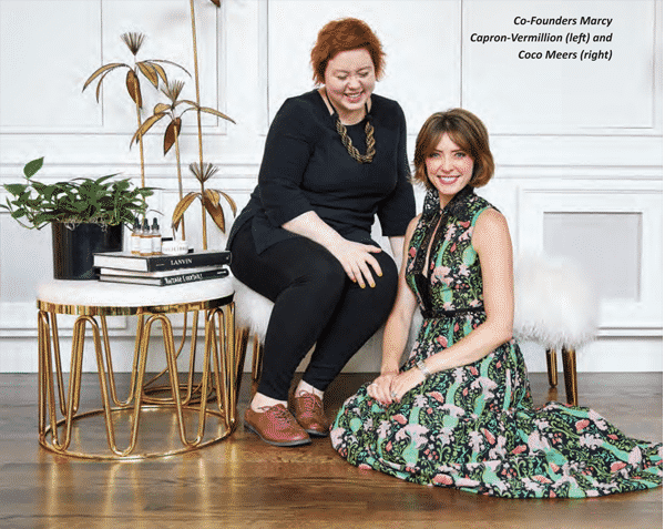 two women CEOs seated for picture