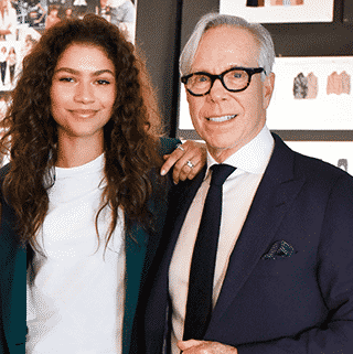 Tommy Hilfiger poses with Zendaya