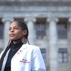 LaShyra Nolen stands outside of class looking confidents at Harvard