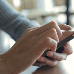 Close up of woman using mobile phone