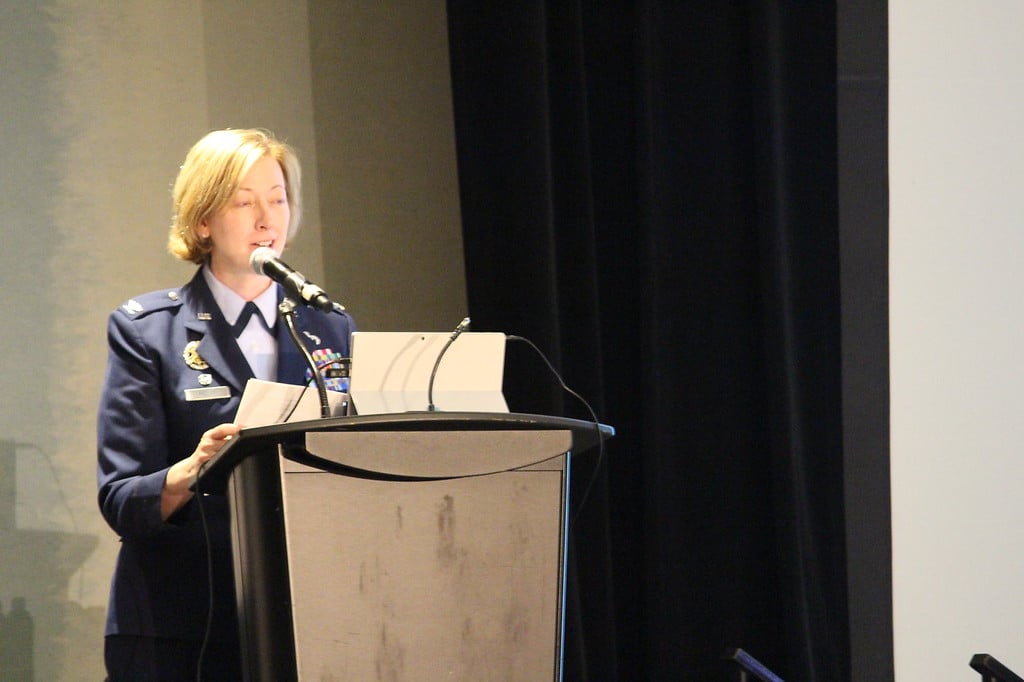 Colonel Stephany Kelly talking at a podium